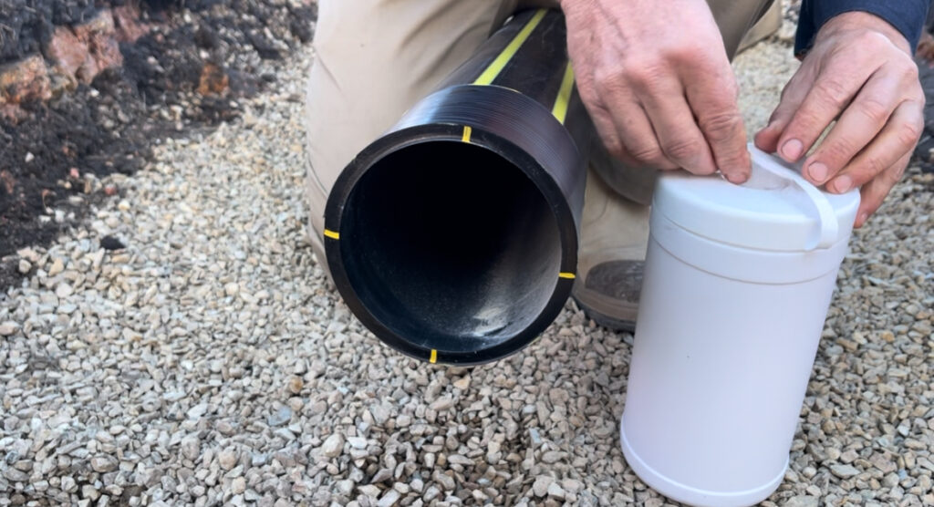 Lernna trainer demonstrating pipe peeling for EF welding on PE pipe
